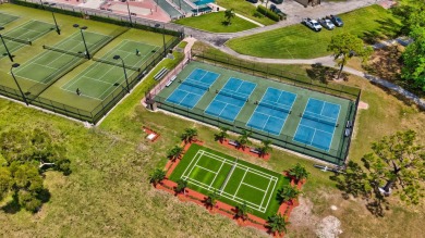 Discover exceptional lakeside living in this rare, rentable on Hillsboro Pines Golf in Florida - for sale on GolfHomes.com, golf home, golf lot