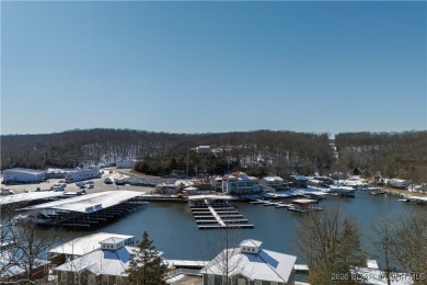 This beautiful 4-bedroom home offers great water views from one on The Oaks Golf Course in Missouri - for sale on GolfHomes.com, golf home, golf lot