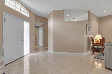 This 2 bedroom, 2 bath villa with 2 car garage offers an on TPC Prestancia in Florida - for sale on GolfHomes.com, golf home, golf lot