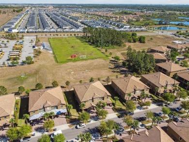 One or more photo(s) has been virtually staged. Welcome to the on The Oasis Club at Champions Gate in Florida - for sale on GolfHomes.com, golf home, golf lot