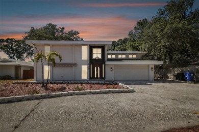 Welcome to this exquisite home in the prestigious Lakewood on St. Petersburg Country Club in Florida - for sale on GolfHomes.com, golf home, golf lot