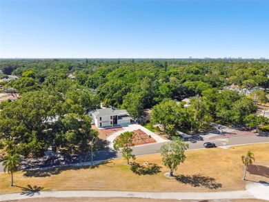 Welcome to this exquisite home in the prestigious Lakewood on St. Petersburg Country Club in Florida - for sale on GolfHomes.com, golf home, golf lot