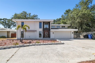 Welcome to this exquisite home in the prestigious Lakewood on St. Petersburg Country Club in Florida - for sale on GolfHomes.com, golf home, golf lot