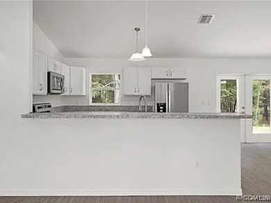 What a deal for this 3-year-old home in Citrus Springs! No on Pine Ridge Community Golf and Country Club in Florida - for sale on GolfHomes.com, golf home, golf lot