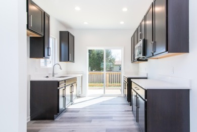Norfolk Homes introduces new construction townhomes at the on Alwyn Downs Golf Club in Michigan - for sale on GolfHomes.com, golf home, golf lot