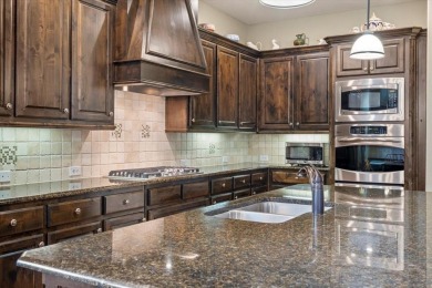 This stunning 1.5-story home with almost 3,400 sqft by American on The Lakes at Castle Hill Golf Club in Texas - for sale on GolfHomes.com, golf home, golf lot