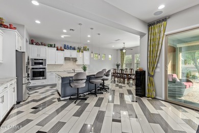 PERFECTLY POSITIONED on GOLF COURSE, this stunning upgraded on Poston Butte Golf Club in Arizona - for sale on GolfHomes.com, golf home, golf lot