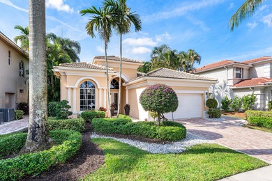 This former model home in Mizner Country Club has IMMEDIATE GOLF on Mizner Country Club in Florida - for sale on GolfHomes.com, golf home, golf lot