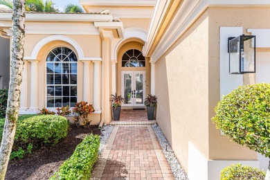 This former model home in Mizner Country Club has IMMEDIATE GOLF on Mizner Country Club in Florida - for sale on GolfHomes.com, golf home, golf lot