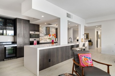 A sophisticated desert retreat in the guard-gated Desert Island on Desert Island Golf and Country Club in California - for sale on GolfHomes.com, golf home, golf lot