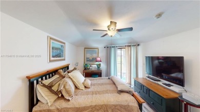 Vacation Home Condo | Enjoy great view of the golf course right on Lehigh Resort Club in Florida - for sale on GolfHomes.com, golf home, golf lot
