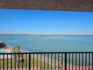 WOW VIEW! Wake up to the open waters of Boca Ciega Bay every on Isla Del Sol Yacht and Country Club in Florida - for sale on GolfHomes.com, golf home, golf lot