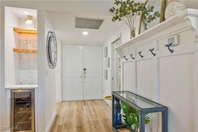 This fully remodeled, turnkey first-floor residence in the on Club at Pelican Bay Golf Course in Florida - for sale on GolfHomes.com, golf home, golf lot