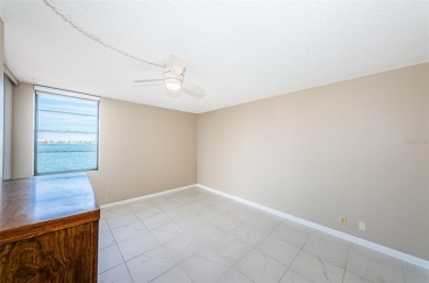 WOW VIEW! Wake up to the open waters of Boca Ciega Bay every on Isla Del Sol Yacht and Country Club in Florida - for sale on GolfHomes.com, golf home, golf lot