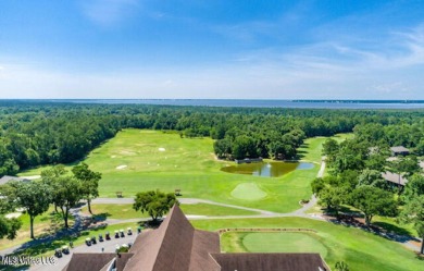 Beautiful waterfront lot with deep water access located on the on Diamondhead Country Club in Mississippi - for sale on GolfHomes.com, golf home, golf lot