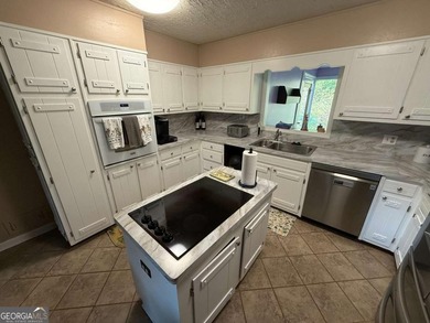 Wonderfully maintained and perfectly located, this 4-bedroom, 2 on Honey Creek Country Club in Georgia - for sale on GolfHomes.com, golf home, golf lot