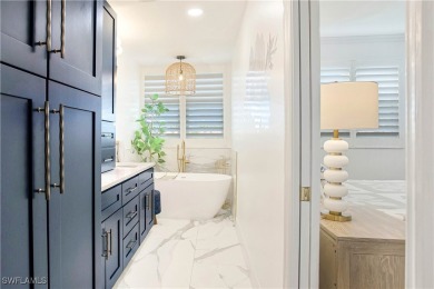 This fully remodeled, turnkey first-floor residence in the on Club at Pelican Bay Golf Course in Florida - for sale on GolfHomes.com, golf home, golf lot