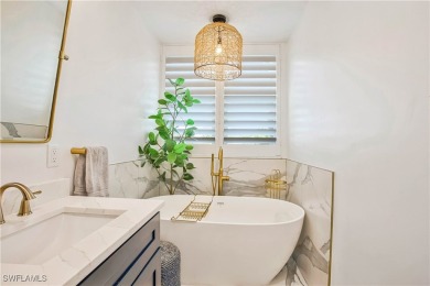 This fully remodeled, turnkey first-floor residence in the on Club at Pelican Bay Golf Course in Florida - for sale on GolfHomes.com, golf home, golf lot