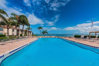 WOW VIEW! Wake up to the open waters of Boca Ciega Bay every on Isla Del Sol Yacht and Country Club in Florida - for sale on GolfHomes.com, golf home, golf lot