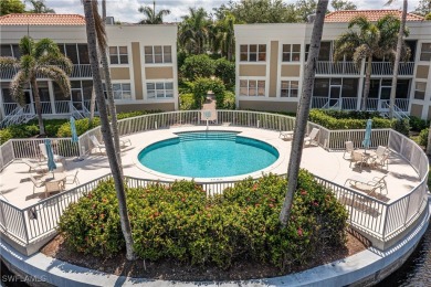 This fully remodeled, turnkey first-floor residence in the on Club at Pelican Bay Golf Course in Florida - for sale on GolfHomes.com, golf home, golf lot