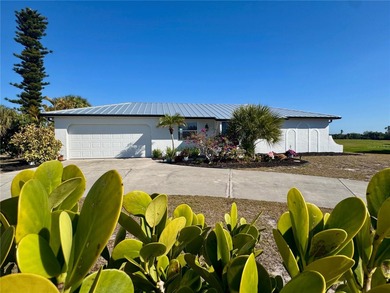 ATTENTION GOLFERS + BOATERS! Positioned on an ELEVATED CORNER on Rotonda Golf and Country Club The Hills Course in Florida - for sale on GolfHomes.com, golf home, golf lot