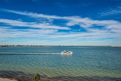 WOW VIEW! Wake up to the open waters of Boca Ciega Bay every on Isla Del Sol Yacht and Country Club in Florida - for sale on GolfHomes.com, golf home, golf lot