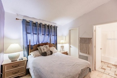 Tucked behind Bobby Jones Golf Course, *The Hideaway* is one of on Bobby Jones Golf Club in Florida - for sale on GolfHomes.com, golf home, golf lot