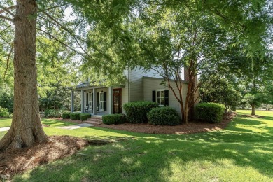 Nestled behind the private gates of Champions Retreat in on Champions Retreat Golf Club in Georgia - for sale on GolfHomes.com, golf home, golf lot