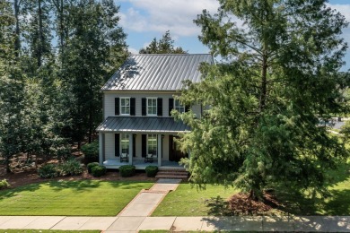 Nestled behind the private gates of Champions Retreat in on Champions Retreat Golf Club in Georgia - for sale on GolfHomes.com, golf home, golf lot