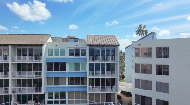 Two-bedroom, two-bath penthouse condo with extra room/office at on Isla Del Sol Yacht and Country Club in Florida - for sale on GolfHomes.com, golf home, golf lot