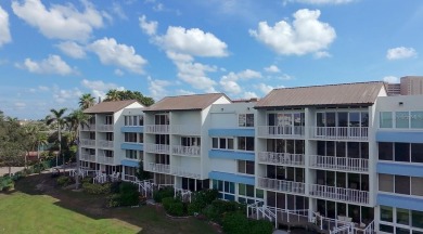 Two-bedroom, two-bath penthouse condo with extra room/office at on Isla Del Sol Yacht and Country Club in Florida - for sale on GolfHomes.com, golf home, golf lot