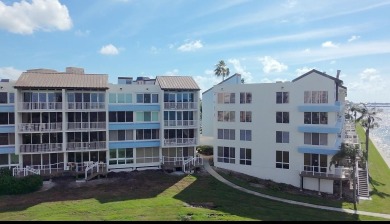 Two-bedroom, two-bath penthouse condo with extra room/office at on Isla Del Sol Yacht and Country Club in Florida - for sale on GolfHomes.com, golf home, golf lot