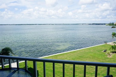 Two-bedroom, two-bath penthouse condo with extra room/office at on Isla Del Sol Yacht and Country Club in Florida - for sale on GolfHomes.com, golf home, golf lot