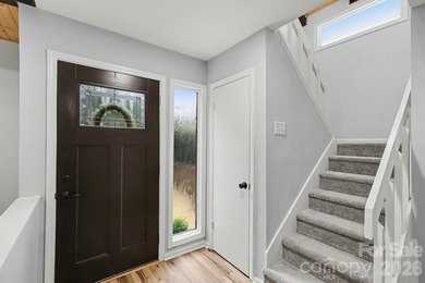 Welcome to this beautifully updated 3-bedroom, 2 1/2-bath on Raintree Country Club in North Carolina - for sale on GolfHomes.com, golf home, golf lot