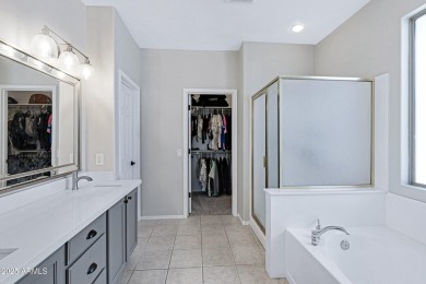This delightful single-story residence offers 3 spacious on The Golf Club At Johnson Ranch in Arizona - for sale on GolfHomes.com, golf home, golf lot