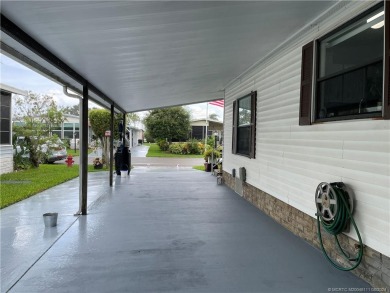 LOCATION! BRAND NEW WINDOWS! This home backs up to the on Indianwood Golf and Country Club in Florida - for sale on GolfHomes.com, golf home, golf lot