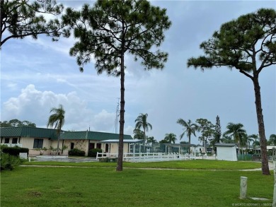 LOCATION! BRAND NEW WINDOWS! This home backs up to the on Indianwood Golf and Country Club in Florida - for sale on GolfHomes.com, golf home, golf lot