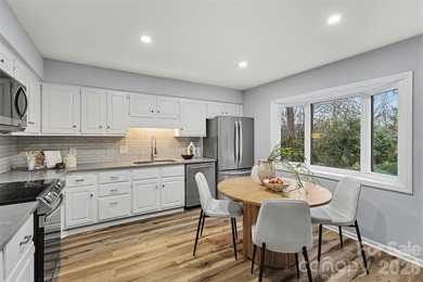 Welcome to this beautifully updated 3-bedroom, 2 1/2-bath on Raintree Country Club in North Carolina - for sale on GolfHomes.com, golf home, golf lot