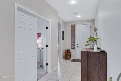 This delightful single-story residence offers 3 spacious on The Golf Club At Johnson Ranch in Arizona - for sale on GolfHomes.com, golf home, golf lot