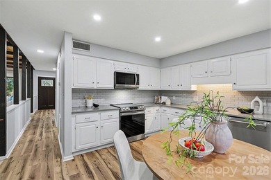 Welcome to this beautifully updated 3-bedroom, 2 1/2-bath on Raintree Country Club in North Carolina - for sale on GolfHomes.com, golf home, golf lot