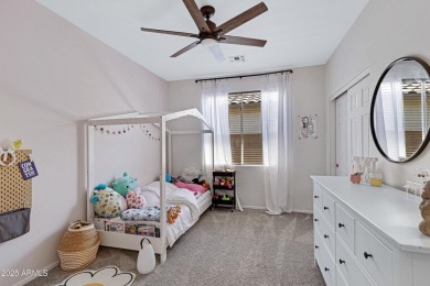 This delightful single-story residence offers 3 spacious on The Golf Club At Johnson Ranch in Arizona - for sale on GolfHomes.com, golf home, golf lot