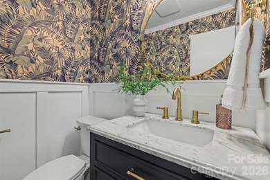 Welcome to this beautifully updated 3-bedroom, 2 1/2-bath on Raintree Country Club in North Carolina - for sale on GolfHomes.com, golf home, golf lot