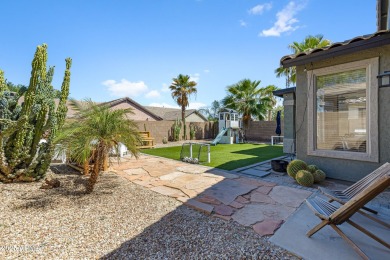 This delightful single-story residence offers 3 spacious on The Golf Club At Johnson Ranch in Arizona - for sale on GolfHomes.com, golf home, golf lot