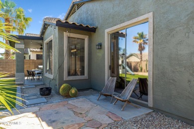 This delightful single-story residence offers 3 spacious on The Golf Club At Johnson Ranch in Arizona - for sale on GolfHomes.com, golf home, golf lot