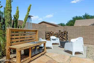 This delightful single-story residence offers 3 spacious on The Golf Club At Johnson Ranch in Arizona - for sale on GolfHomes.com, golf home, golf lot