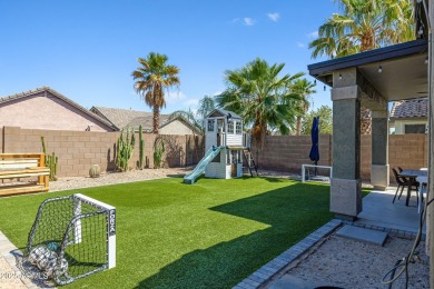 This delightful single-story residence offers 3 spacious on The Golf Club At Johnson Ranch in Arizona - for sale on GolfHomes.com, golf home, golf lot