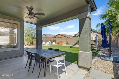 This delightful single-story residence offers 3 spacious on The Golf Club At Johnson Ranch in Arizona - for sale on GolfHomes.com, golf home, golf lot