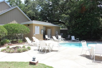 Nestled under the trees in a tranquil setting just off Ft Morgan on The Golf Club of the Wharf in Alabama - for sale on GolfHomes.com, golf home, golf lot