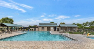 This delightful single-story residence offers 3 spacious on The Golf Club At Johnson Ranch in Arizona - for sale on GolfHomes.com, golf home, golf lot