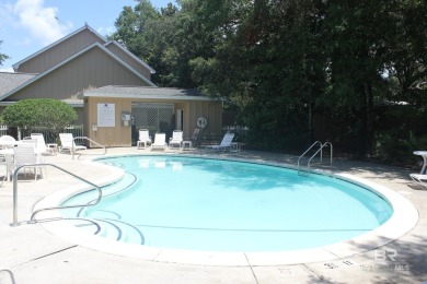 Nestled under the trees in a tranquil setting just off Ft Morgan on The Golf Club of the Wharf in Alabama - for sale on GolfHomes.com, golf home, golf lot